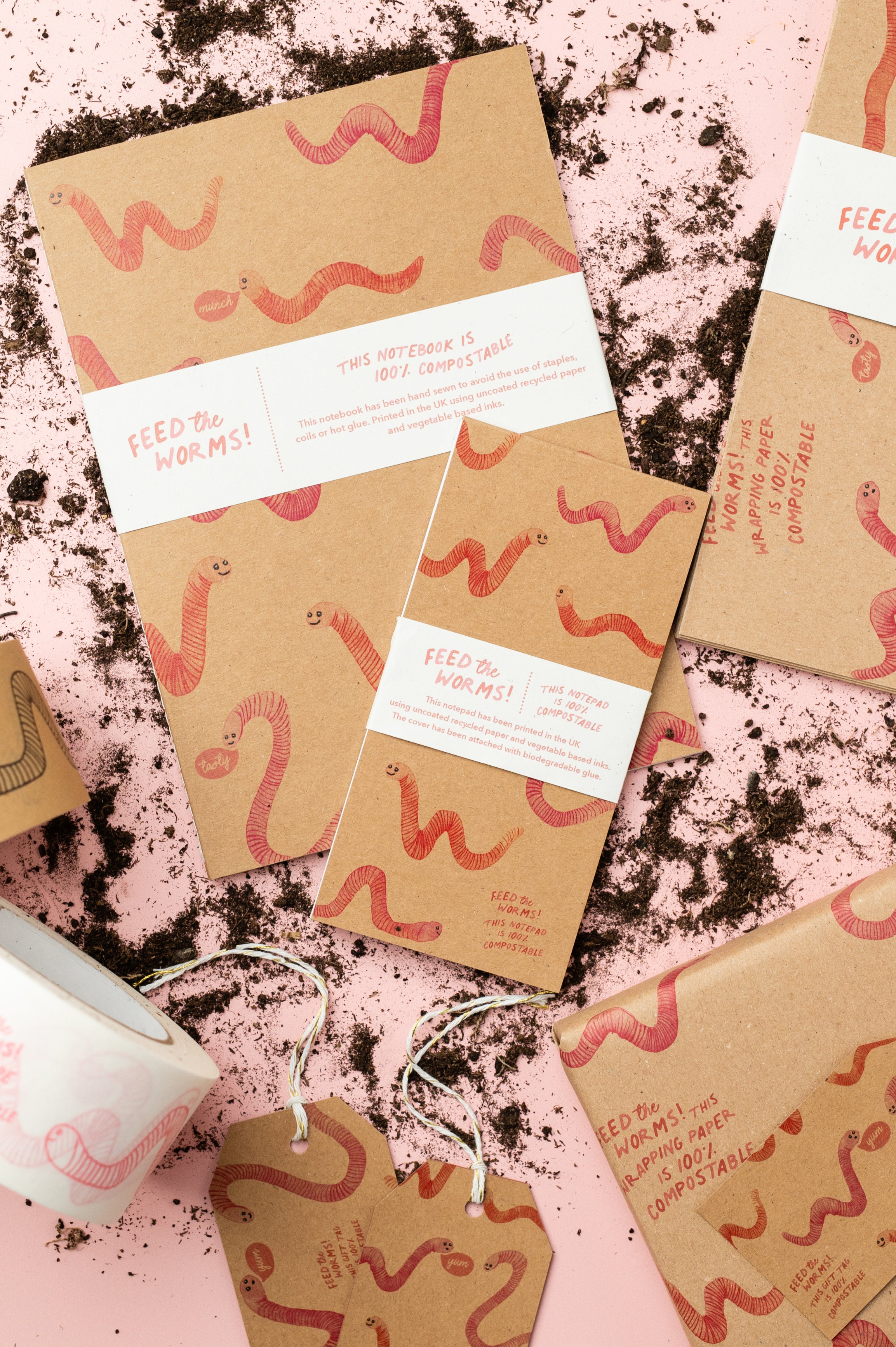 Ruby & Bo Feed The Worms 100% Compostable Stationery collection on a pink background