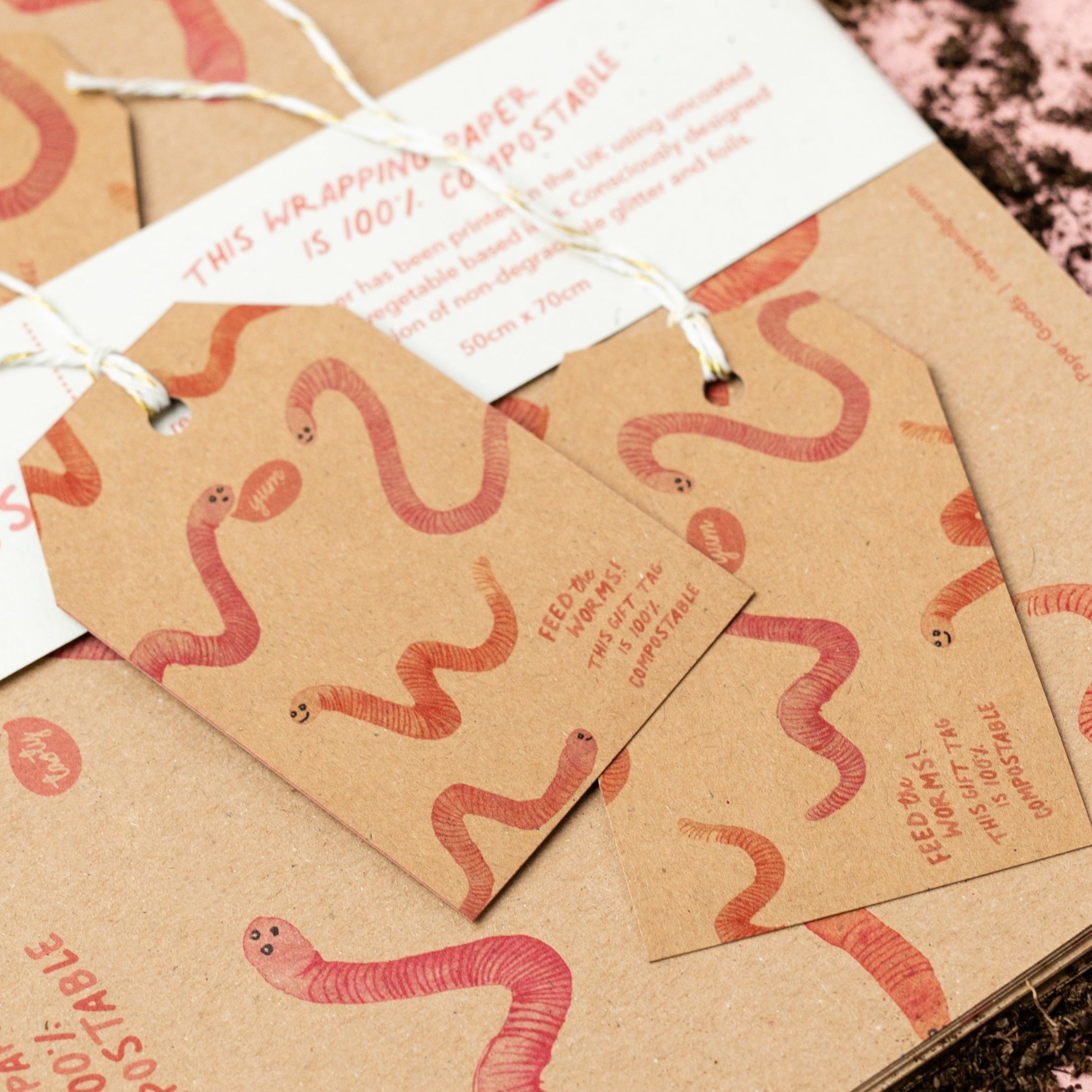 A close up of Ruby &amp; Bo Feed The Worms 100% Compostable Wrap &amp; Gift Tag Set