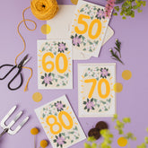 A selection of Ruby & Bo plantable age cards displayed on a lilac background