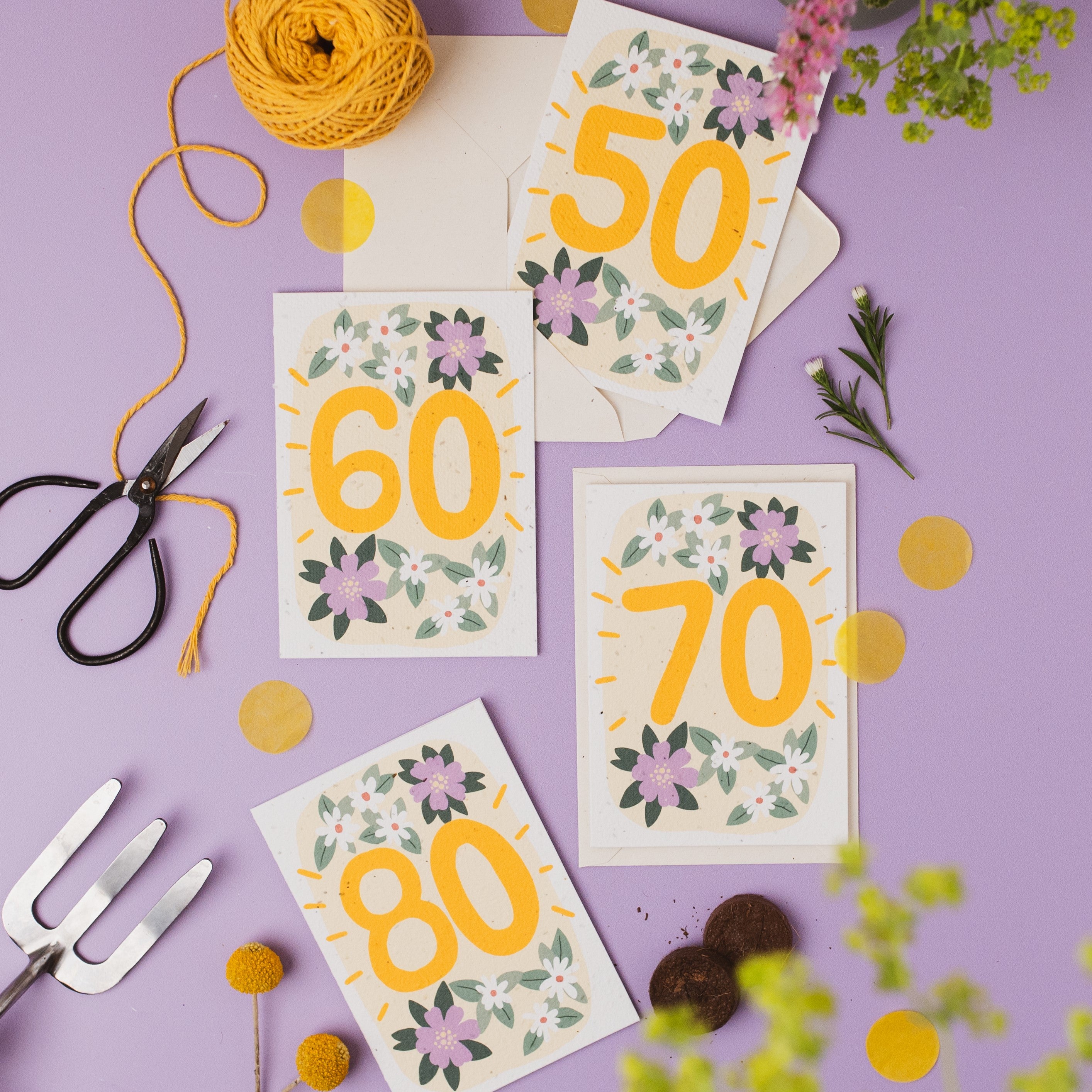 A selection of Ruby &amp; Bo plantable age cards displayed on a lilac background