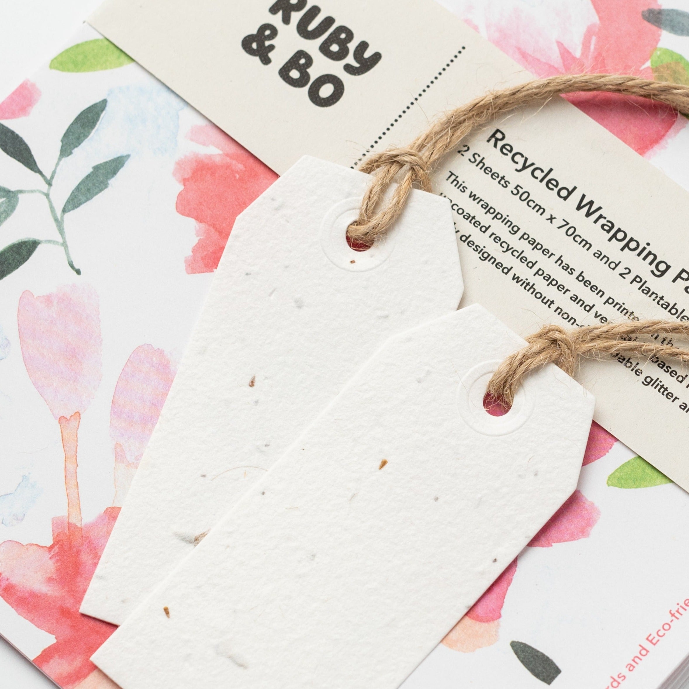A close up of Ruby &amp; Bo Roses Recycled Wrap &amp; Plantable Tag Set