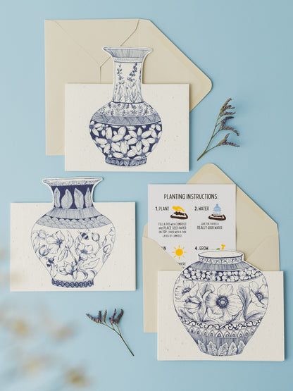 Garniture of three plantable vase cards shown on a pale blue background